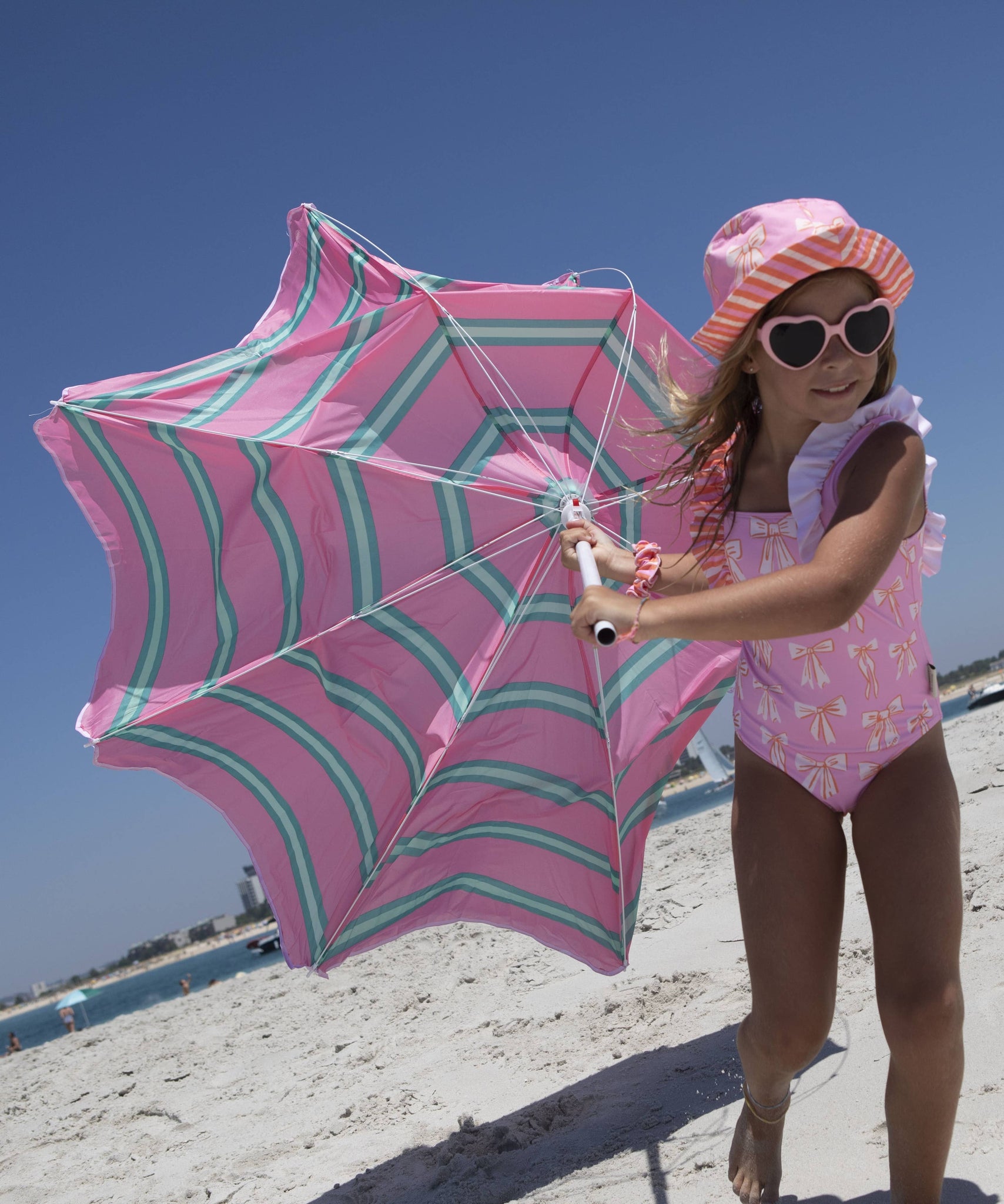 Beach stripes and bows swimsuit: 8Y