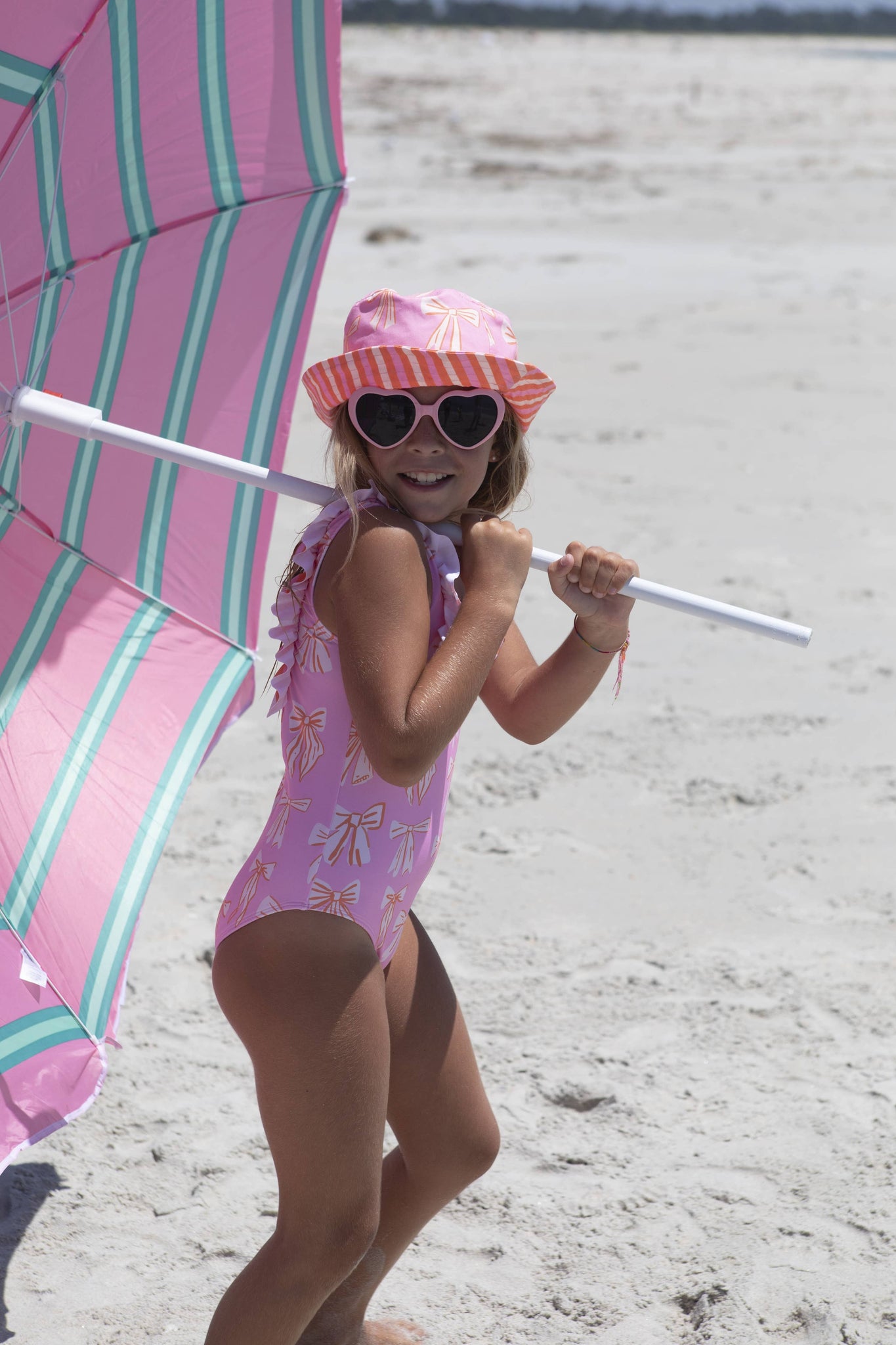 Beach stripes and bows swimsuit: 8Y