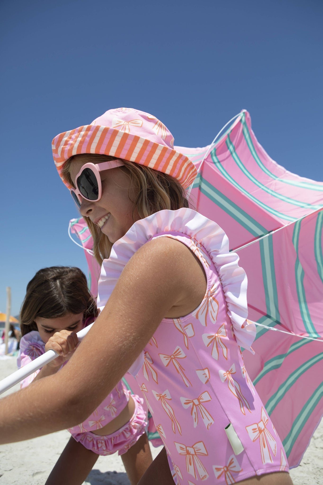 Beach stripes and bows swimsuit: 8Y
