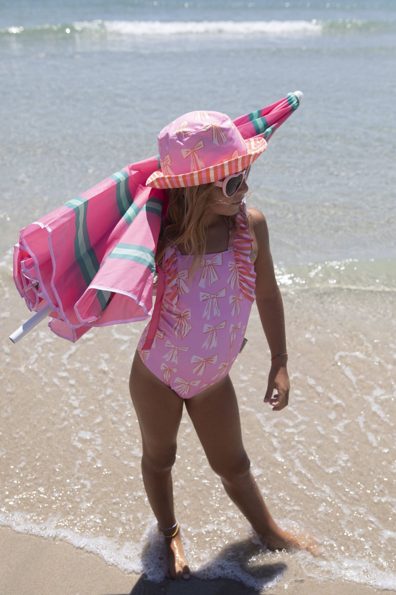 Beach stripes and bows swimsuit: 6Y